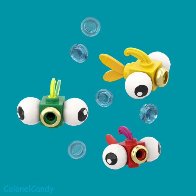A trio of fish built with LEGO bricks, swimming towards you with bubbles floating around. One is yellow, one is green and the other is red with a purple fin. They have huge eyes on the side of their heads, each as big as their little body. Their round open mouths are represented by the Lord of the Ring ring piece, giving them a surprised, goldfish-like expression.